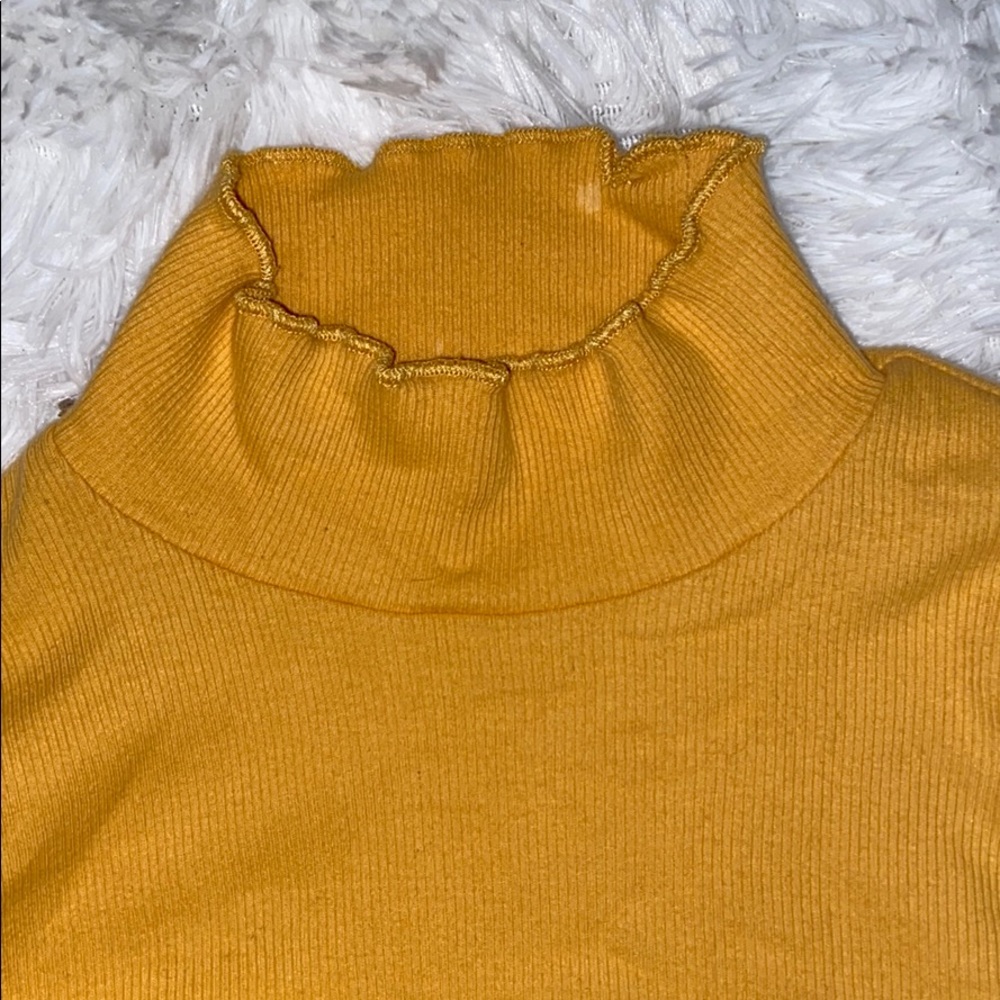 yellow sweater